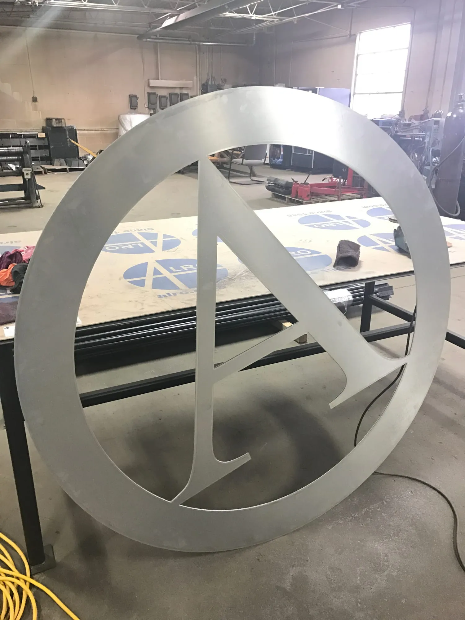 Cut metal ring sign