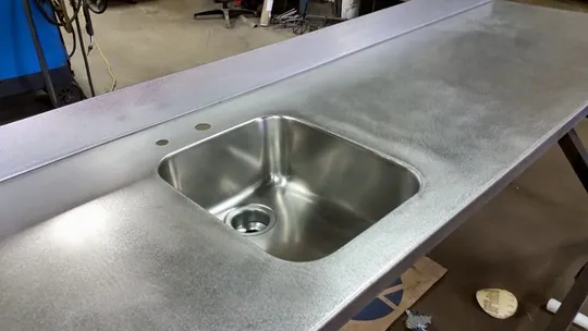 Metal countertop with stainless sink