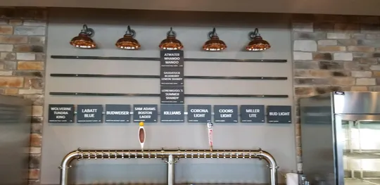 Custom tap-wall signage panel